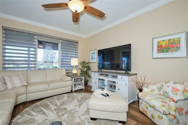 living room featuring crown molding, dark hardwood / wood-style floors, and ceiling fan