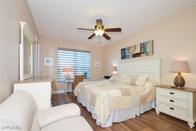 bedroom with dark wood-type flooring and ceiling fan