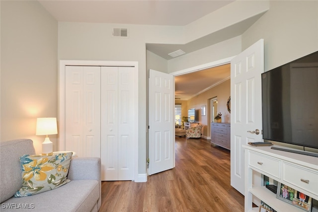 sitting room featuring hardwood / wood-style flooring