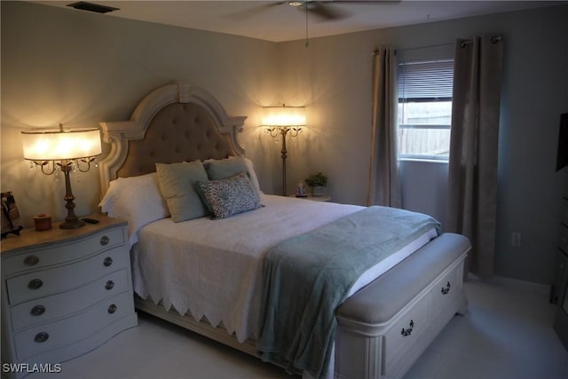 bedroom with visible vents and a ceiling fan