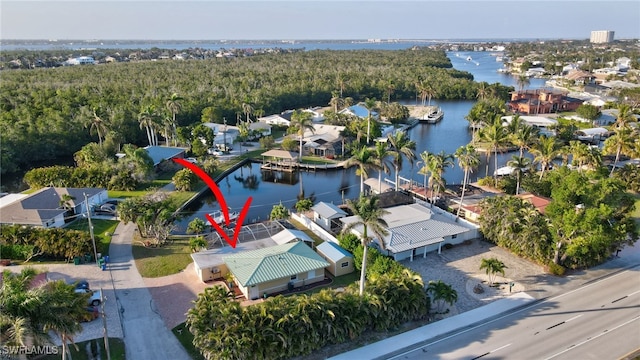aerial view with a water view and a residential view