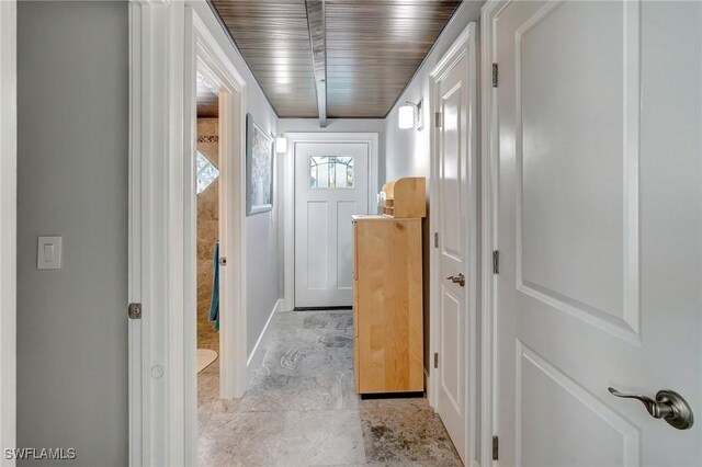doorway with baseboards