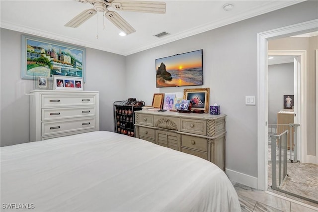 bedroom featuring crown molding, visible vents, baseboards, and a ceiling fan