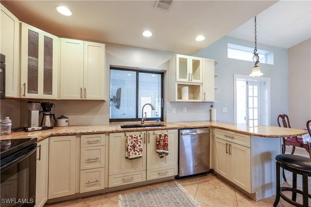 kitchen featuring sink, light stone counters, stainless steel dishwasher, kitchen peninsula, and pendant lighting