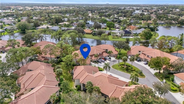 drone / aerial view with a water view