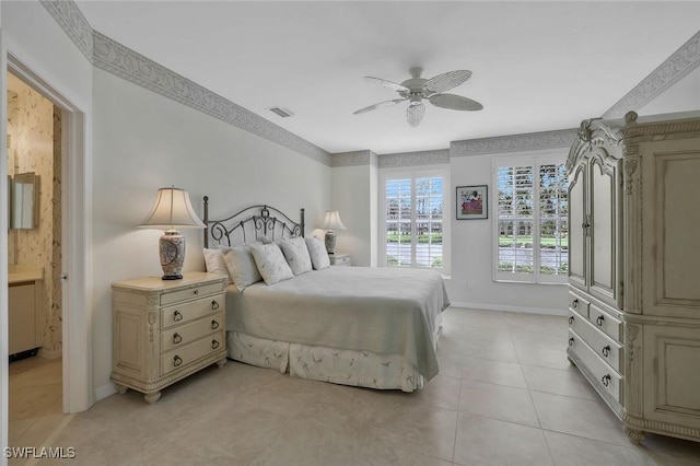 bedroom featuring light tile patterned floors, baseboards, visible vents, and ceiling fan