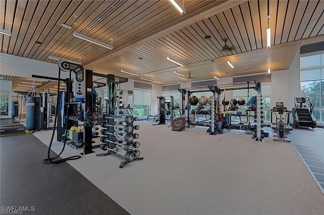 workout area with wooden ceiling