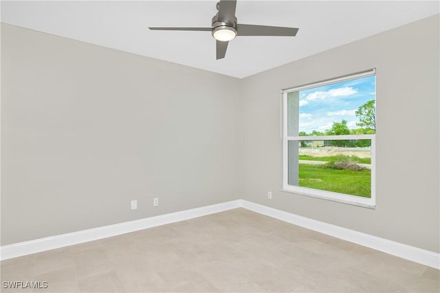 unfurnished room with ceiling fan