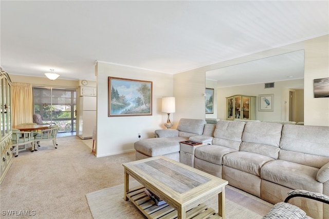 carpeted living room featuring crown molding