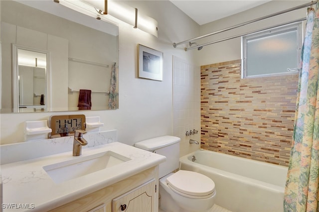 full bathroom with vanity, shower / tub combo with curtain, and toilet