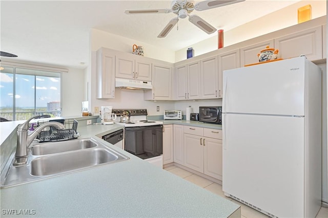 kitchen featuring light tile patterned flooring, white cabinetry, sink, ceiling fan, and white appliances