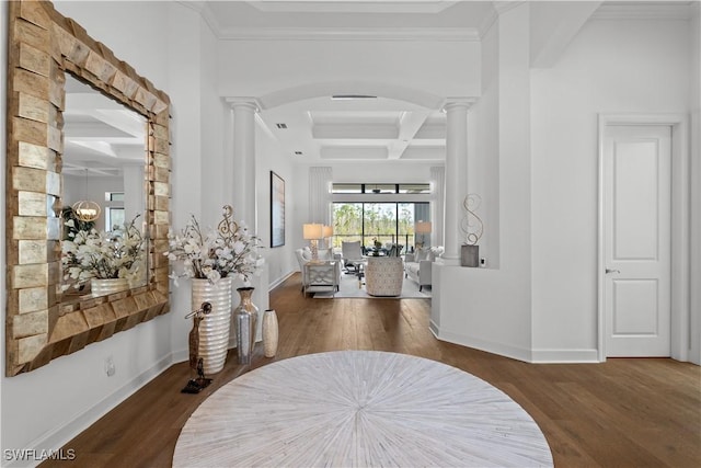 entrance foyer featuring ornate columns, baseboards, coffered ceiling, and wood finished floors