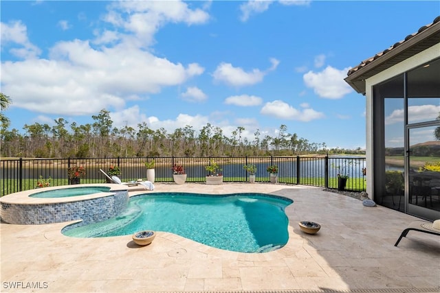 view of swimming pool with a pool with connected hot tub, a fenced backyard, and a patio