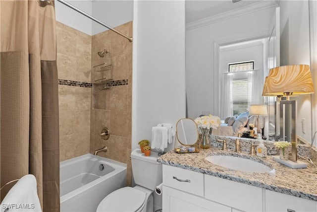 bathroom featuring ornamental molding, shower / tub combo with curtain, vanity, and toilet