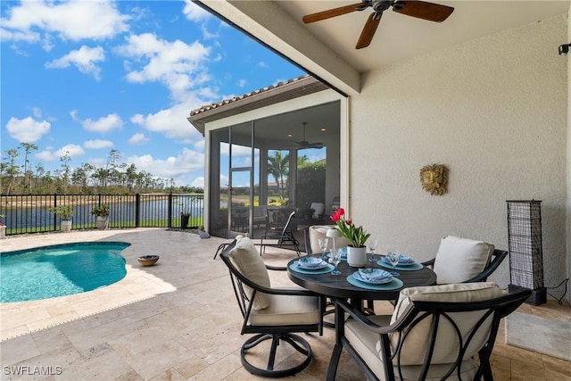 view of swimming pool featuring a ceiling fan, a fenced in pool, a fenced backyard, and a patio