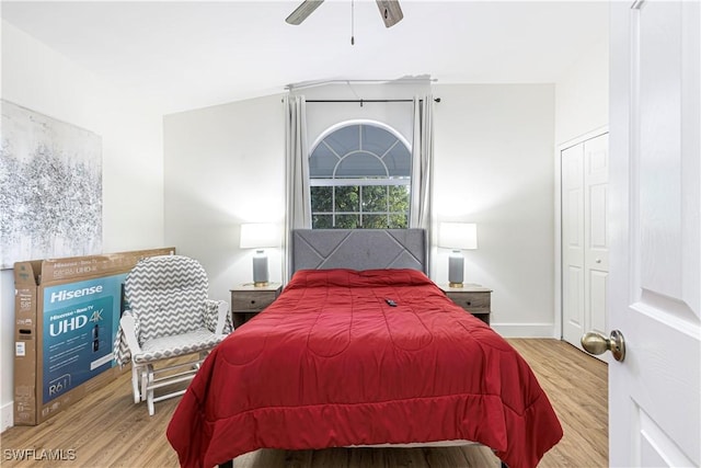 bedroom featuring a closet, ceiling fan, and light wood-type flooring