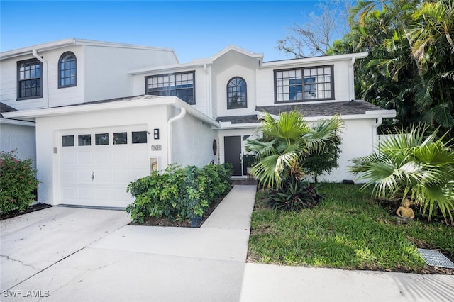 view of front of home with a garage