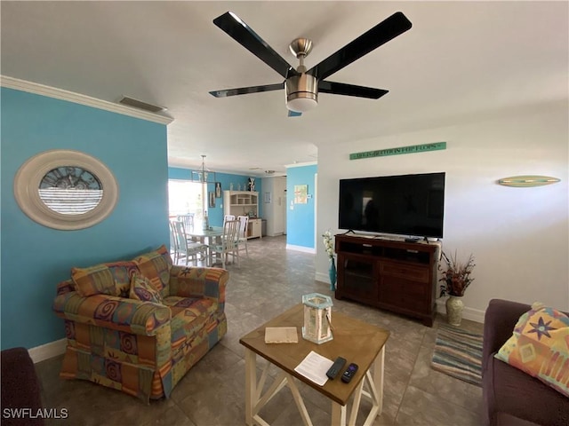 living area featuring visible vents, ceiling fan, and baseboards