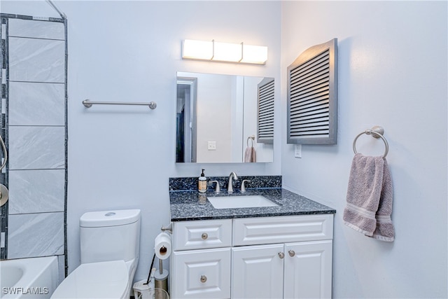 bathroom with vanity and toilet