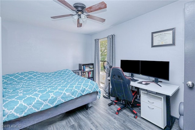 bedroom with ceiling fan and light wood-type flooring