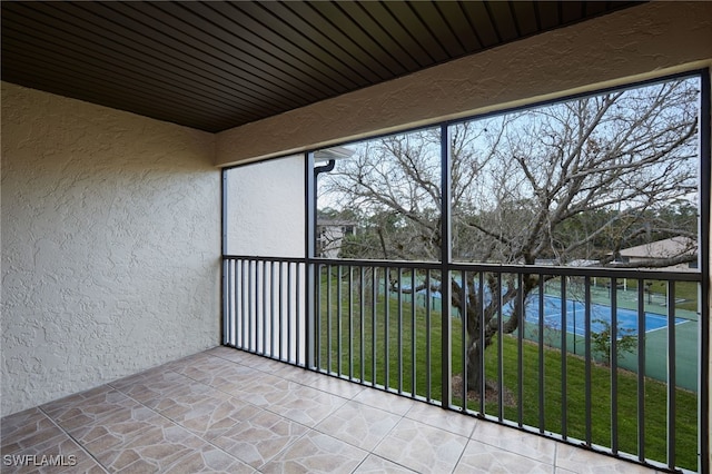 unfurnished sunroom with a healthy amount of sunlight