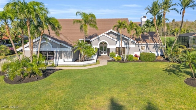 view of front facade with a front yard