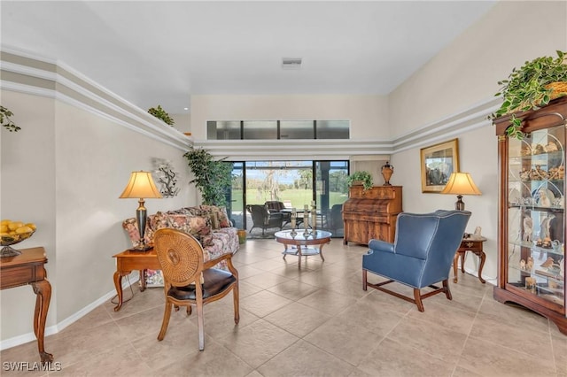 sitting room featuring light tile patterned floors