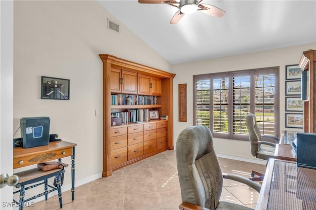 tiled office space with vaulted ceiling and ceiling fan