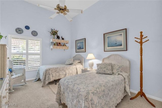 bedroom with light carpet and ceiling fan