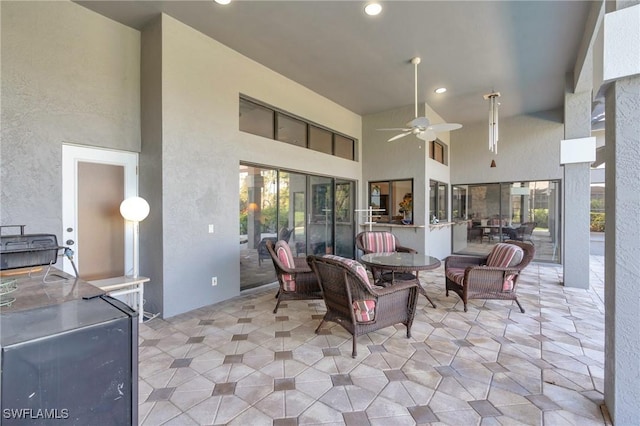 view of patio / terrace featuring ceiling fan