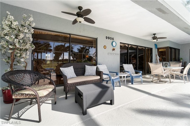 view of patio with an outdoor hangout area and ceiling fan