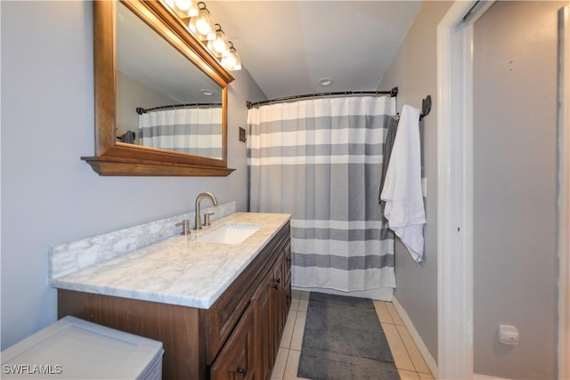 bathroom featuring tile patterned flooring, vanity, and a shower with shower curtain