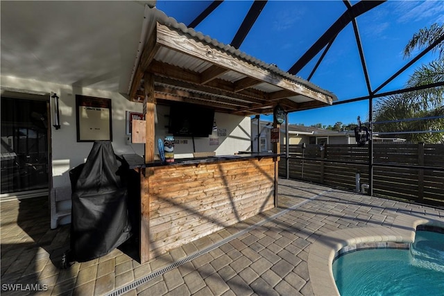 view of patio / terrace featuring an outdoor bar