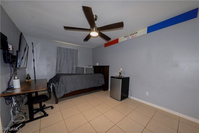 tiled bedroom with ceiling fan