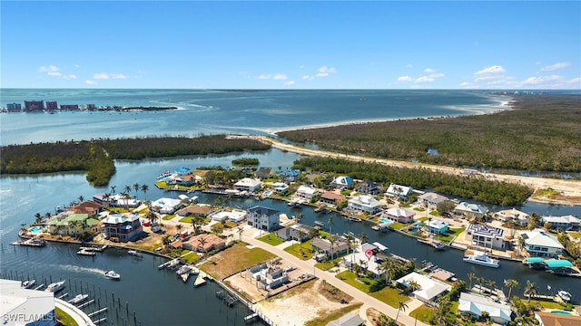 drone / aerial view featuring a water view