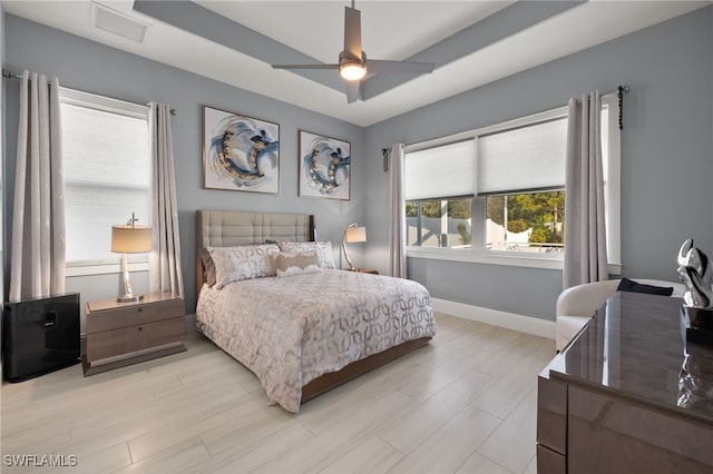 bedroom featuring ceiling fan and light hardwood / wood-style flooring