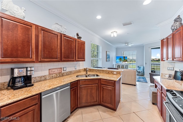 kitchen with stainless steel appliances, ornamental molding, sink, and kitchen peninsula