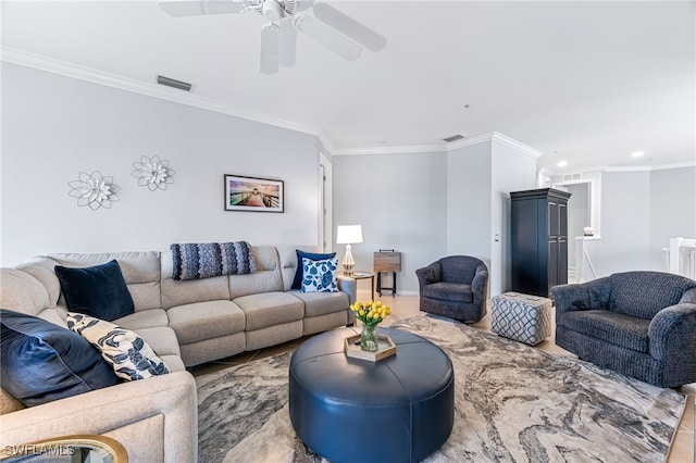 living room featuring ornamental molding and ceiling fan