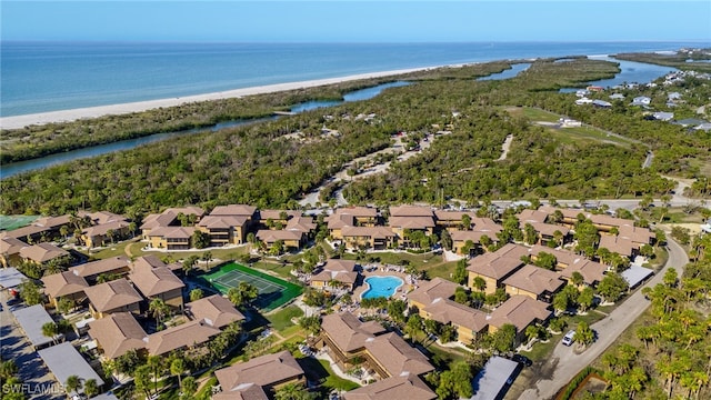 aerial view featuring a view of the beach and a water view