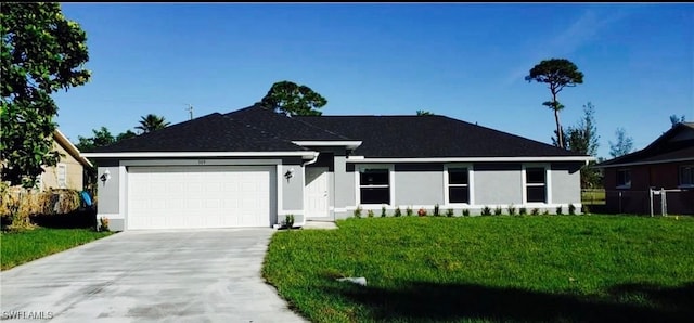 single story home with a garage and a front yard