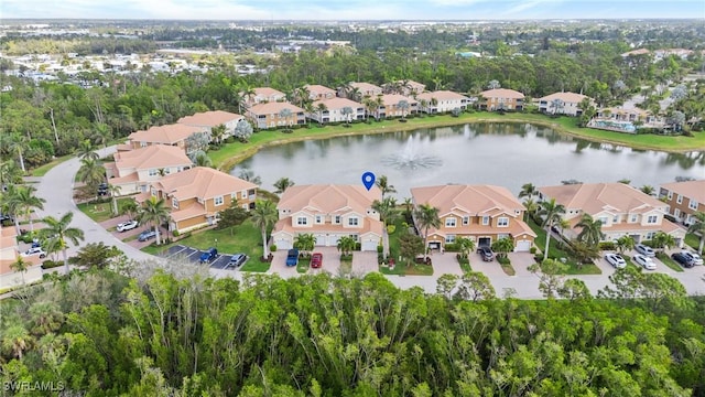 aerial view featuring a residential view and a water view