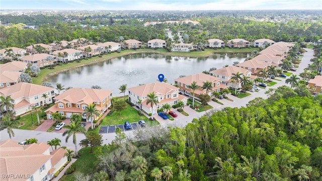 aerial view featuring a water view and a residential view