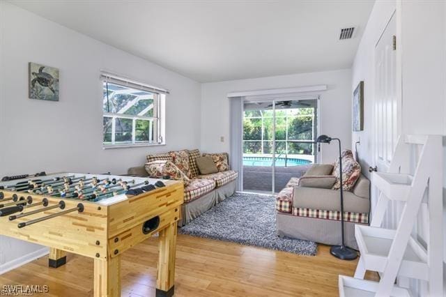 playroom with wood-type flooring