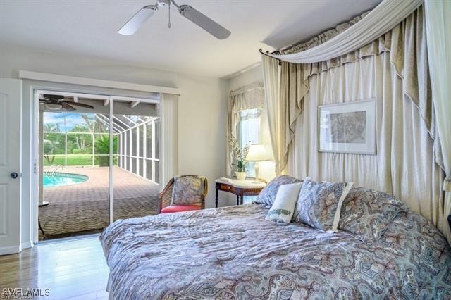 bedroom featuring ceiling fan, wood-type flooring, and access to exterior