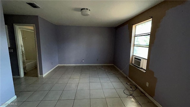 unfurnished room with light tile patterned floors