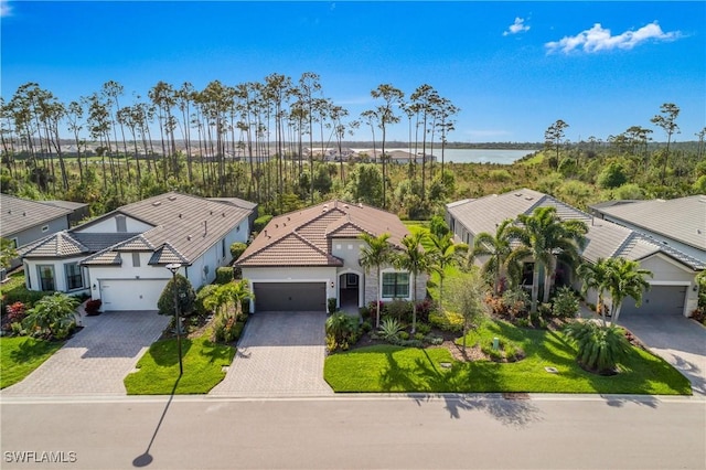 bird's eye view with a water view