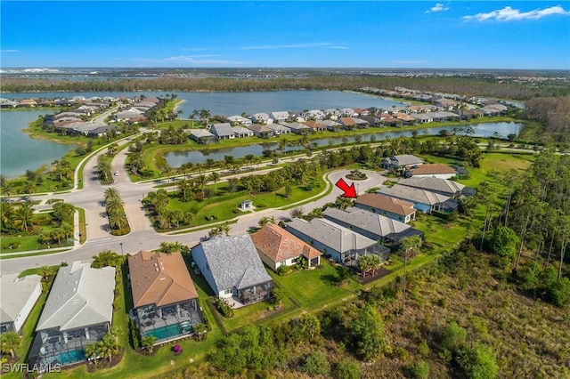 bird's eye view with a water view