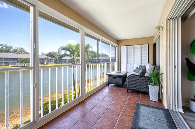 sunroom with a water view