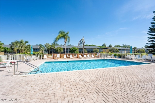 view of swimming pool featuring a patio