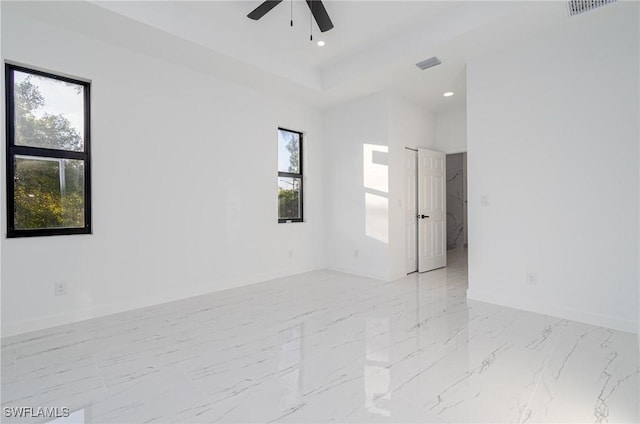 empty room featuring ceiling fan